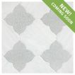 The Angelique waterjet tile module in Mugla White Crest tile and Verde Laguna Flower tile, seen with a tumbled and bush-hammered finish.