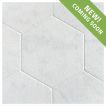 Timeless Tumbled 10-1/2" Hexagon tile in Mugla White marble, seen with a tumbled and bush-hammered finish.