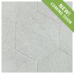 The Timeless Tumbled 10-1/2" Hexagon tile in Verde Laguna marble, seen with a tumbled and bush-hammered finish.