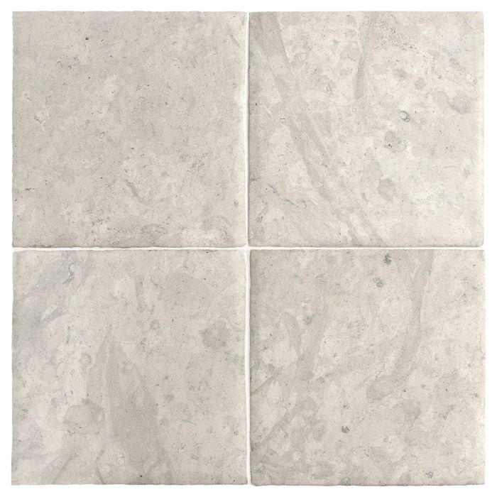 Four tiles of the Chateau Lyon 8" x 8" tiles in Tunisian Grey with a hand burnished finish.