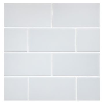 The Truetones Ceramic 3" x 6" subway tile in Hint of Grey gloss.