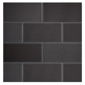 The Truetones Ceramic 3" x 6" subway tile in Toasted Grey Gloss.
