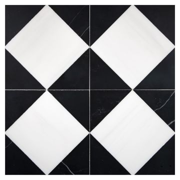 A field of the Asquare mosaic, made from honed Bianco Dolomiti Select and Nero Marquina marble, in a consistent layout. A field of the Asquare mosaic, made from honed Bianco Dolomiti Select and Nero Marquina marble, in a consistent layout.