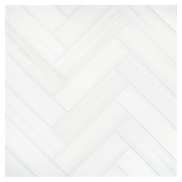 A field of the 1-1/2" X 6" Herringbone mosaic in honed Bianco Dolomiti Select marble.