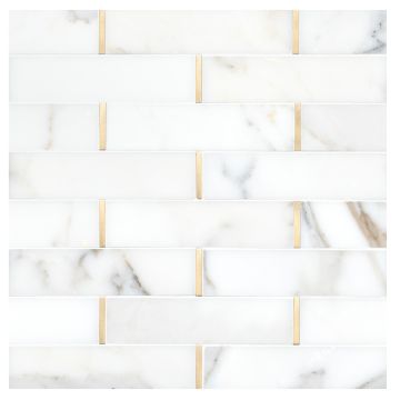 A field of the Touch of Brass mosaic in Calacatta Gold polished marble with matte brass accents, part of the Specialty Mosaics collection. A field of the Touch of Brass mosaic in Calacatta Gold polished marble with matte brass accents, part of the Specialty Mosaics collection.