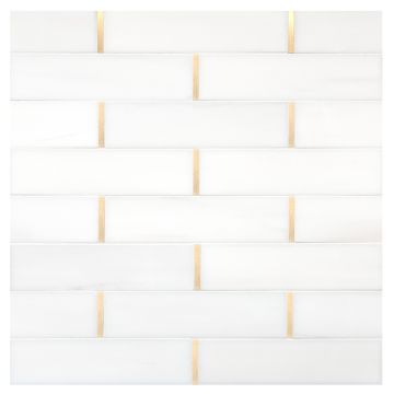 A field of the Touch of Brass mosaic in Bianco Dolomiti Select polished marble with matte brass accents A field of the Touch of Brass mosaic in Bianco Dolomiti Select polished marble with matte brass accents