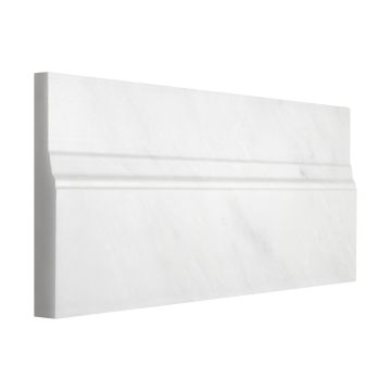 Three quarter view of the 5" x 12" Base molding in honed Asian Carrara Ultra Premium marble.