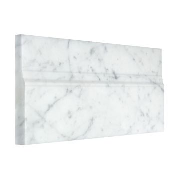 Three quarter view of the 5" x 12" Base molding in honed Italian Carrara Light Select marble.