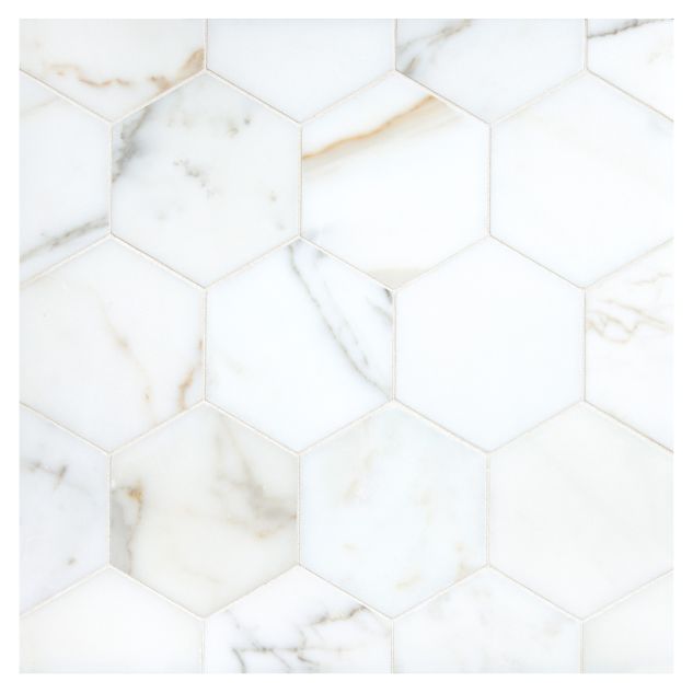 A field of the 3-1/2" Hexagon mosaic in honed Calacatta Gold marble.