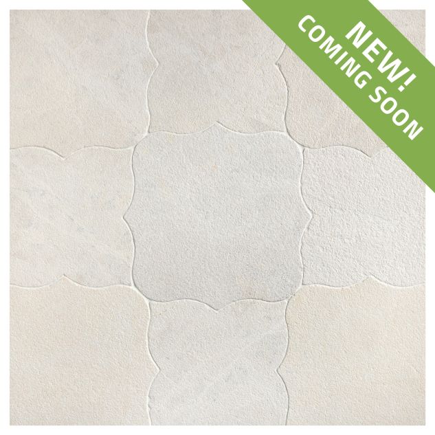 The Angelique Crest + Flower waterjet tile module in Vanilla Ice marble, seen in a tumbled and bush-hammered finish.