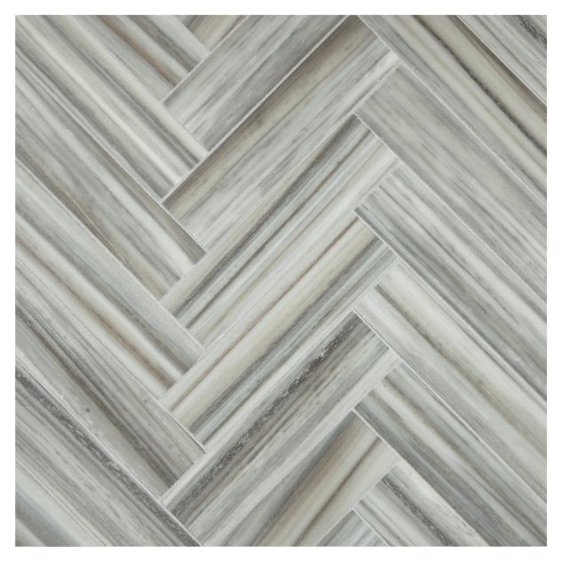 A field of the 1-1/2" X 6" Herringbone mosaic in honed Grigio Striatini marble.