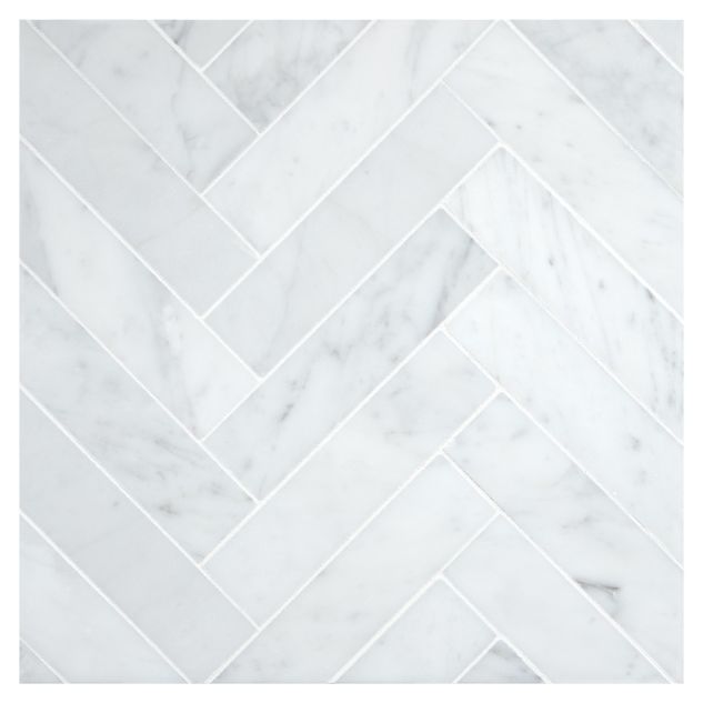 A field of the 1-1/2" X 6" Herringbone mosaic in polished Italian Carrara Light Select marble.