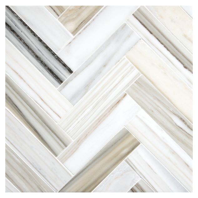 A field of the 1-1/2" X 6" Herringbone mosaic in polished Oro Striato marble.