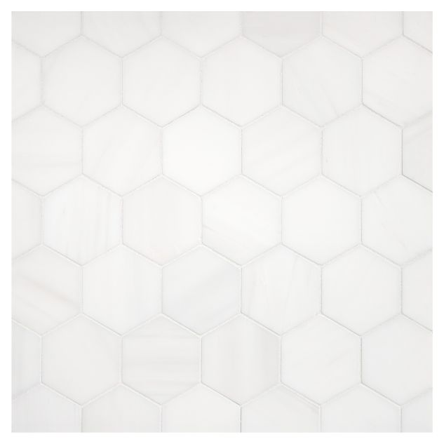 A field of the 2-1/4" Hexagon mosaic in honed Bianco Dolomiti Select marble.