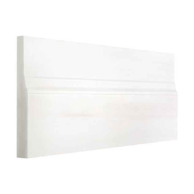 Three quarter view of the 5" x 12" base molding in honed Bianco Dolomiti Select marble.